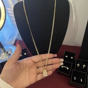 14k gold hollow Cuban chain with Jesus pendant